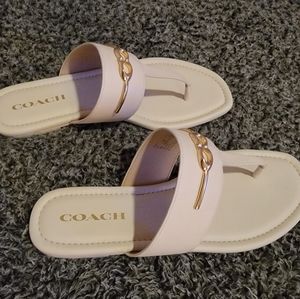 Never worn Coach sandals.